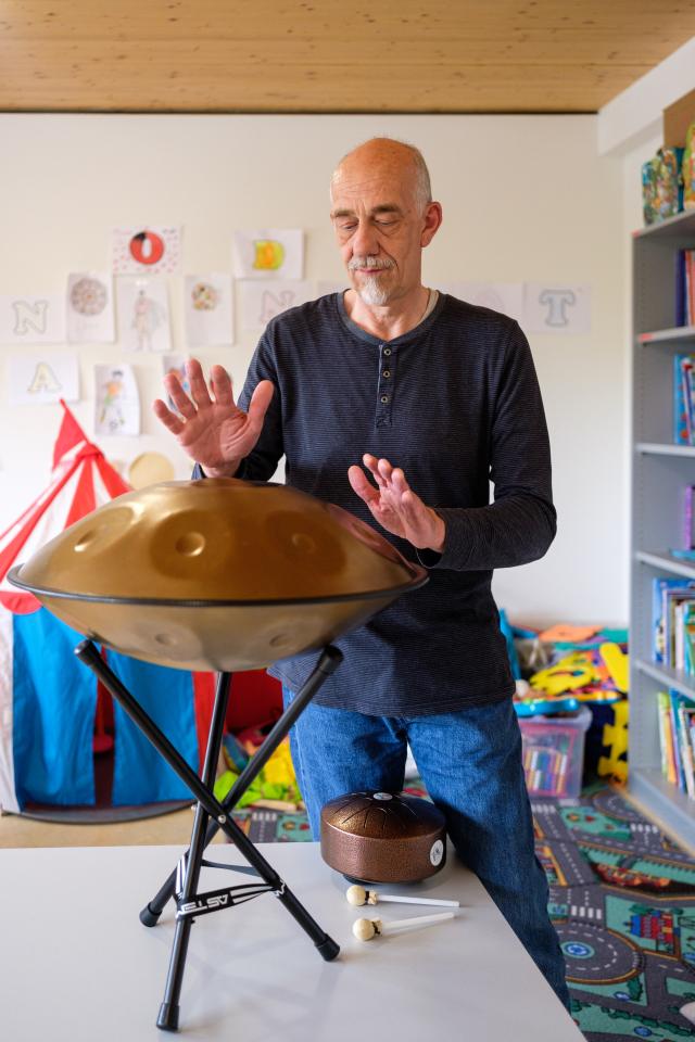 Person playing a cymbal