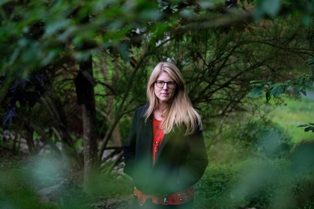 Portrait of Nathalie Esser outdoors, surrounded by nature