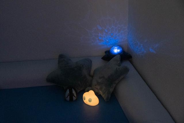 Photo of a small light in the corner of a relaxation room